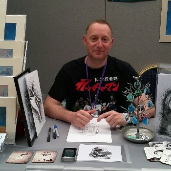 Nathan live drawing at a comic con