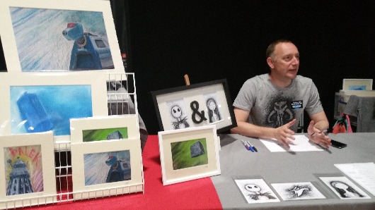 Nathan live drawing at a comic con